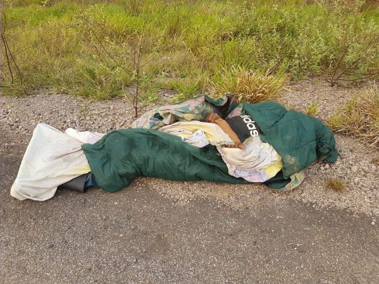 Hallan cadáver envuelto con herida de bala en la cabeza de un menor de 16 años en Bella Vista Norte
